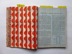 an open book with two different patterns on it