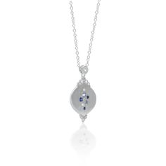 Evocative of falling raindrops, this pendant features a lovely array of blue sapphires and aquamarines with diamond accents. Set in sterling silver to accentuate the cool tones of the stones. Sterling Silver Blue Sapphire Aquamarine Diamond Satin Finish 16-18" Adjustable Sterling Silver Chain Style sc506-3 Blue Teardrop Pendant Jewelry With Diamond Accents, Blue Teardrop Pendant Fine Necklace, Blue Teardrop Pendant With Diamond Accents, Blue Teardrop Pendant Necklace With Adjustable Chain, Sterling Silver Necklace With Diamond Accents, Teardrop Pendant, Silver Chain Style, Aqua Marine, Rain Drops, Cool Tones