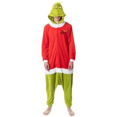 a man in a red and green pajamas is wearing an adult size grin face costume