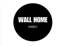 a black circle with the words wall home on it