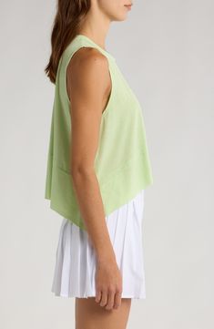 A classic addition to your workout collection, this muscle tee is cut from a soft and stretchy blend that feels breezy and light. 20" length (size Medium) Crewneck Sleeveless 90% polyester, 10% elastane Machine wash, dry flat By Free People; imported Solid Color Summer Workout Tops, Cotton Tank Tops Athleisure Style, Relaxed Fit Sleeveless Tops With Moisture-wicking, Relaxed Fit Sleeveless Moisture-wicking Tops, Sporty Cotton Muscle Tee For Spring, Sporty Crew Neck Muscle Tee For Spring, Relaxed Fit Crew Neck Tank Top For Athleisure, Summer Athleisure Muscle Tee With Crew Neck, Fitted Moisture-wicking Tops For Summer