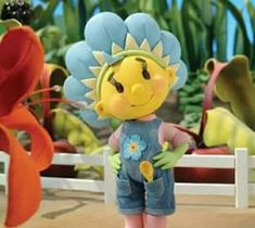 a cartoon character is standing in front of some flowers