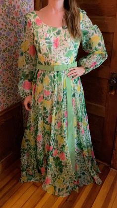 "70s Garden Party Dress w Sheer Sleeves and Velvet Belt. This pretty piece is perfect for a spring wedding or your next fundraiser. It is union made in the USA, ILGWU.  Decade: early 70s Bust: 36-38\" Shoulder: 15.5\" Arm Length: 26\" Waist:29:\" Hip: Full Skirt, 52\" Length: 57\" Condition: Excellent" 1970s Style Green Summer Dresses, 1950s Style Spring Cocktail Dresses, Spring A-line Vintage Dress For Cocktail, Spring A-line Vintage Cocktail Dress, Spring Cocktail Vintage A-line Dress, Spring Party Vintage Maxi Dress, Spring Formal Vintage Maxi Dress, 1950s Spring Vintage Event Dress, Spring Vintage Dress For Formal Events, A-line