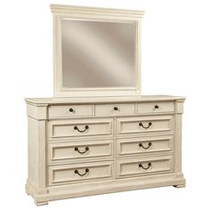 a white dresser with a mirror on top of it and drawers below the dresser is shown