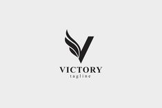 the victory tagline logo is black and white with a leaf on it's side