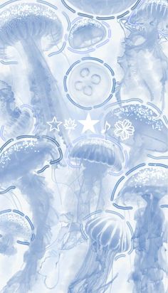 an image of jellyfish in the water with stars and circles on it's sides