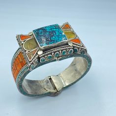 The Beautiful Hand Made Vintage Nepali Tibetan Silver Bracelet Decorated Beautifully With Coral and Turquoise With Unique Historic Patterns Designs . Conditions Of Items Is Clearly Shown In The Pictures Above Fast and Free Shipping World Wide Traditional Blue Gemstone Bracelets, Bohemian Blue Bracelets With Inlay, Turquoise Bangle Bracelet For Festival, Bohemian Turquoise Gemstone Bangle, Traditional Blue Bracelets With Natural Stones, Traditional Turquoise Beaded Bangle Bracelets, Traditional Turquoise Bracelet With Inlay, Traditional Turquoise Bangle Bracelets, Traditional Turquoise Bangle Bracelet