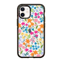 an iphone case with colorful flowers and leaves on the front, in white background is shown