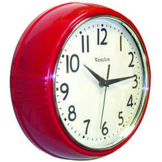 a red wall clock with black hands and numbers