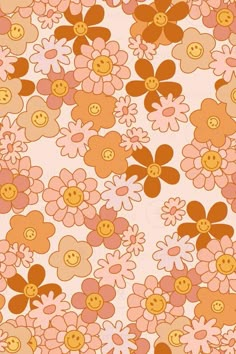 an orange and pink flower pattern with smiley faces on it's petals, as well as buttons