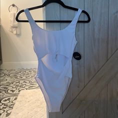 Lulus White One Piece Swimsuit. Never Worn. Cute Cut Out White Sleeveless Cutout Bodysuit, White Cutout One-piece Bodysuit, White One Piece Swimsuit, White One Piece, Cute Cuts, Womens Swim, One Piece Swimsuit, Cut Out, Color White