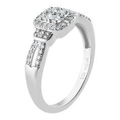 Shine bright with this ring adorned with dazzling diamonds. Shine bright with this ring adorned with dazzling diamonds. Nickel free Metal: sterling silver Packaging: boxed Plating: rhodium Width: 8 mm Finish: polishedDIAMOND DETAILS Total weight: 1/3 ct. Shape: round Setting: micro pave Diamond weights are approximate. Diamond Total Weights may vary between .01 and .13 ct. Some diamonds consist of fewer than 17 facets. Gemstones may have been treated to enhance their appearance. Special care may Silver Halo Ring With Pave Setting And Round Cut, Silver Halo Ring With Pave Setting, Gift Diamond White Diamond Ring With Halo Setting, Cubic Zirconia Halo Ring With Pave Setting For Promise, Diamond White Diamond Ring With Halo Setting As Gift, Dazzling Diamond White Rings With Pave Setting, White Topaz Diamond Ring With Halo Setting, Sterling Silver Diamond White Promise Ring, Anniversary Silver Halo Ring With Pave Setting