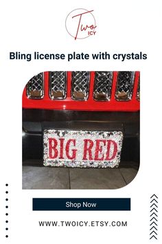 a red truck with the word big red on it's front grill and license plate