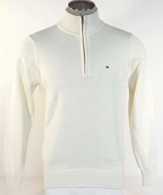 TOMMY HILFIGER 1/2 ZIP COTTON KNIT SWEATER - BRAND: TOMMY HILFIGER - STYLE: 1/2 ZIP SWEATER - STYLE #: 897803762 116 - COLOR: FENCE WHITE (OFF WHITE) - 1/2 Zip Mock Neckline - Double Collar - (1-Off White Knit and 1-Tan Knit) - Ribbed Knit Neckline, Cuffs and Bottom - Small Tommy Hilfiger Logo Embroidered on Upper Left - 100% Cotton Fabric: 100% Cotton MEASUREMENTS FOR VARIOUS SIZES: (approx) SMALL: Center shoulder to bottom: 26 1/2" Armpit to armpit: (measured across front, garment laying flat) Double Collar, Tommy Hilfiger Logo, Sweater Brands, Mock Neckline, Zip Sweater, Cotton Knit, White Half-zip Sweater With Ribbed Collar, White Half-zip Sweater, Tommy Hilfiger Fashion