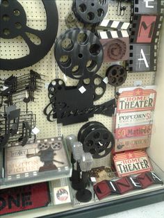 there are many movie related items on the wall