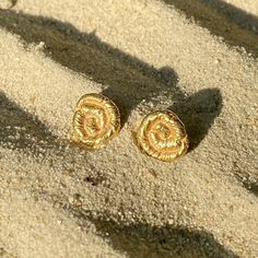 The Nautilus collection serves as a tribute to the beauty of marine life and a reminder of the importance of environmental awareness. These simple stud earrings in 18ct gold plated brass feature the distinctive nautilus shape and are perfect for everyday wear. We are committed to supporting marine conservation efforts, which is why we donate 5% of all Nautilus sales to The Ocean Cleanup. By choosing to wear a piece from this collection, you can make a positive impact on the world around us and l Ocean Cleanup, The Nautilus, Marine Conservation, Simple Stud Earrings, Environmental Awareness, Nautilus, Independent Designers Fashion, Marine Life, Badger