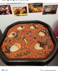 a table that has some sort of game on it with pictures around the top and bottom