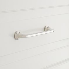 a white cabinet door with a handle on it