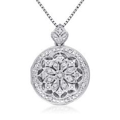 Ross-Simons - Diamond-Accented Round Locket Necklace in Sterling Silver. 18". Artfully crafted with a vintage-style design, this elegant locket necklace glistens with diamond accents in polished sterling silver. The round locket is functional and opens to hold a personal photo inside. Suspends from a sleek box chain. Lobster clasp, diamond-accented locket necklace. Diamond birthstones are the perfect gift for April birthdays. Round Locket Necklace, Diamond Locket, Silver Locket Necklace, Unique Pendant Necklace, Round Locket, Diamond Birthstone, Locket Pendant Necklace, Silver Jewelry Necklace, Expensive Jewelry