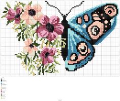 a cross stitch butterfly with flowers on it