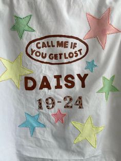 a t - shirt with the words, call me if you get lost daisy on it