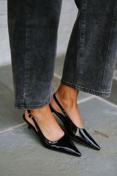 Elevate your style with the sleek and chic Stile Slingback Pumps in black. These patent pumps feature a pointed toe and a secure buckle closure around the ankle, ensuring both comfort and sophistication! 1.75"-2" heel Run true to size Low Heel Dress Shoes, Black Pointed Heels, Black Heels Low, Pointed Heels, Slingback Pump, Sneaker Heels, Black 7, Elevate Your Style, Black Pumps