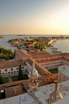 an aerial view of venice, italy with the water and buildings in the foreground