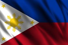 the flag of philippines is waving in the wind