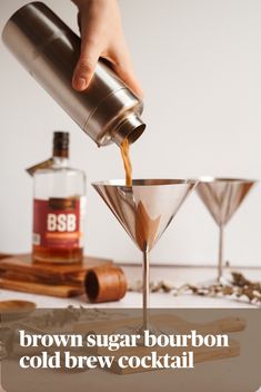 someone pouring sugar into a cocktail glass with the text brown sugar bourbon cold brew cocktail