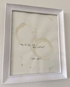 a white frame hanging on the wall with a poem written in cursive writing