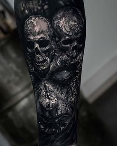 a person with black and white tattoos on their leg is shown in an instagramture