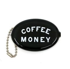 a black coin purse with the words coffee money written on it and a ball chain