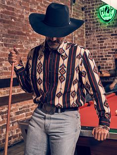 STYLE THAT’S READY TO RODEO Wrangler's Checotah® has a home in the closets of cowboys around the world. This men's Checotah long-sleeve western snap Navajo-inspired printed shirt is designed to make a statement no matter the destination. It features a classic fit, a spread collar, pointed yokes, two snap flap pockets with a convenient pencil slot, adjustable cuffs, and a full-length snap closure for the finishing touch. Best of all, it's crafted from cotton for uncompromising comfort. Look sharp Western Plaid Flannel Shirt For Rodeo, Western Long Sleeve Flannel Shirt For Rodeo, Vintage Western Shirts Men, Men’s Vintage Western Wear, Mens Western Shirts Long Sleeve, Printed Shirts Men, Wrangler Shirts, Rodeo Shirts, Western Women