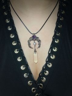 Beautiful handmade antiqued copper amethyst and clear quartz lunar necklace:) It comes with a free 22 inches(50cm) black waxed cotton cord with a sterling silver clasp and a 24 inches(60cm) antiqued copper chain. Minor, natural imperfections on stone. This pendant measures  8.5cm(3.4 inches) from top to bottom and  3.5 cm(1.4 inch) wide. The crystal/semi-precious stone is set using the wire wrapping technique with bare copper. Free standard worldwide shipping for orders over $99 USD:).  All the pieces are made with love and attention to detail:). Bohemian Amethyst Moon Charm Jewelry, Mystical Amethyst Necklaces For Festivals, Spiritual Amethyst Necklace With Moon Charm, Bohemian Amethyst Moon Phase Jewelry, Necklaces Crystal, Wire Wrapping Techniques, Amethyst Necklace Pendant, Necklace Amethyst, Raw Crystal Necklace