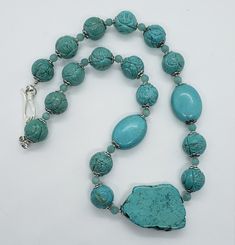 "One of a kind work of art hand crafted by Hawaii artist Myrna Lee Chang. Chunky turquoise necklace with pewter caps, spacers and clasp. This 22\" necklace is made with round and free form natural turquoise pieces. A lovely timeless wearable art piece. It is in excellent unused condition. Suggested retail is $400.00 ALL SALES FINAL. NO RETURNS OR EXCHANGES. PLEASE ASK ALL QUESTIONS AHEAD OF TIME. Feel free to message me with any questions. Photograph have not been enhanced in anyway. I have trie Chunky Turquoise Necklace, Monogram Earrings, Porcelain Roses, Chunky Necklace, Genuine Turquoise, Vintage Turquoise, Art Hand, Natural Turquoise, Wedding Necklace