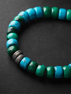 Carolina Bucci is a fourth-generation fine jeweller and with her 'Forte Beads' collection she celebrates self-expression and storytelling. This cord bracelet has white gold tips and blackened Florentine-finished beads and is strung with turquoise and malachite that you can remove, reorder and replace to suit your taste. Luxury Beaded Turquoise Jewelry, Luxury Blue Bracelets With Natural Stones, Luxury Turquoise Round Bead Jewelry, Luxury Blue Bracelet With Natural Stones, Luxury Green Round Bead Bracelets, Luxury Blue Round Bead Bracelets, Turquoise Malachite Beaded Jewelry, Turquoise Hand-strung Stretch Bracelet, Turquoise Hand-strung Stretch Bracelet For Beach