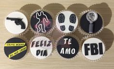 six cupcakes decorated with different types of stickers on top of each other