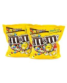 two bags of m & m's candy on a white background, one bag is yellow