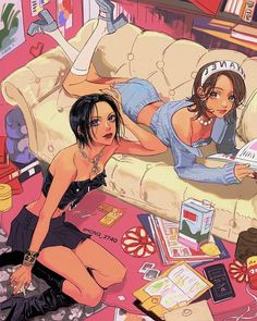 two young women laying on the floor in front of a couch with books and magazines