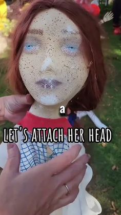 a person holding a doll with the caption let's attach her head