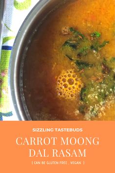 a bowl filled with carrot and broccoli soup