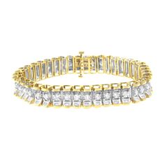 A must have for any serious jewelry collection, this stunning 14K yellow and white gold tennis bracelet boasts an impressive 5.0 carat total weight of diamonds with a whopping 217 individual stones. The bracelet features rectangular links with round, brilliant cut diamonds in four prong settings centered between baguette cut diamonds flush set into the wedged sides of the links, creating a reflective appearance. The interior of the links are 14K white gold, while the outside of the links are mad Gold Tennis Bracelet, Bracelet Tennis, Onyx Bracelet, Baguette Cut Diamond, Tennis Bracelet Diamond, Baguette Cut, Sparkle Diamonds, Tennis Bracelet, High Quality Jewelry