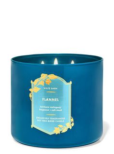 a blue candle that is sitting in front of a white background