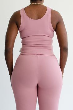 Details : Nylon spandex tank top. Styling : Pair it with our "DIA" pants or "IKA" mini skirt. Fit : Super stretch. Un-lined. True to size. Made in : the USA. 90% Nylon 10% Spandex Model is : wearing a s/m High Stretch Seamless Pink Tank Top, Pink High Stretch Crop Top With Built-in Bra, Pink Crop Top With Built-in Bra And High Stretch, Pink Fitted Crop Top With Built-in Bra, Pink Sleeveless Elastane Activewear, Stretch Pink Tops With Built-in Bra, Fitted Pink Activewear With Built-in Shorts, Pink High Stretch Racerback Tank Top, Pink Elastane Yoga Top