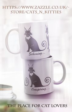 Two coffee mugs stacked on top of each other featuring cat coffee art of mischievous black cat illustrations situated in a bright modern out of focus kitchen. Cat Coffee Art, Cat Themed Birthday Cards, Birthday Reminder, Mugs Coffee, Cat Themed, Black Cartoon, Cat Sitting