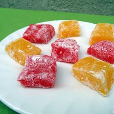 small pieces of gummy candy on a white plate