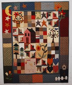 an image of a quilt made with many different colors and designs on it's sides