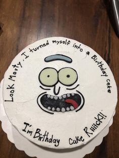 a birthday cake with an image of a cartoon character on it