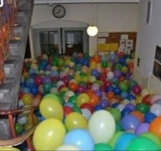 there is a large amount of balloons in the room