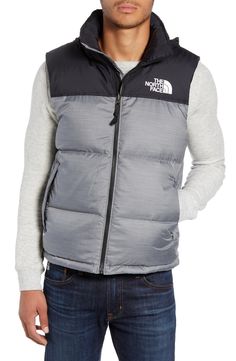 A retro North Face vest based on a baffle-quilted, down-insulated design from 1996 offers unmatched warmth right at the core. The durable ripstop shell with double-layer taffeta at the shoulders is perfect for backpacking, thanks to its packable design that can be stowed in its own pocket. Style Name:The North Face Nuptse 1996 Packable Quilted Down Vest. Style Number: 5698420. The North Face Down Puffer Jacket For Outdoor, The North Face Nylon Puffer Jacket For Cold Weather, Functional Nylon Puffer Jacket By The North Face, Sporty Nylon Puffer Jacket For Hiking, The North Face Nylon Puffer Jacket, Casual Nylon Puffer Jacket For Camping, Outdoor Puffer Vest, Outdoor Puffer Vest With Down Filling, Outdoor Down Puffer Vest